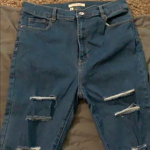 Ripped high rise skinny jeans